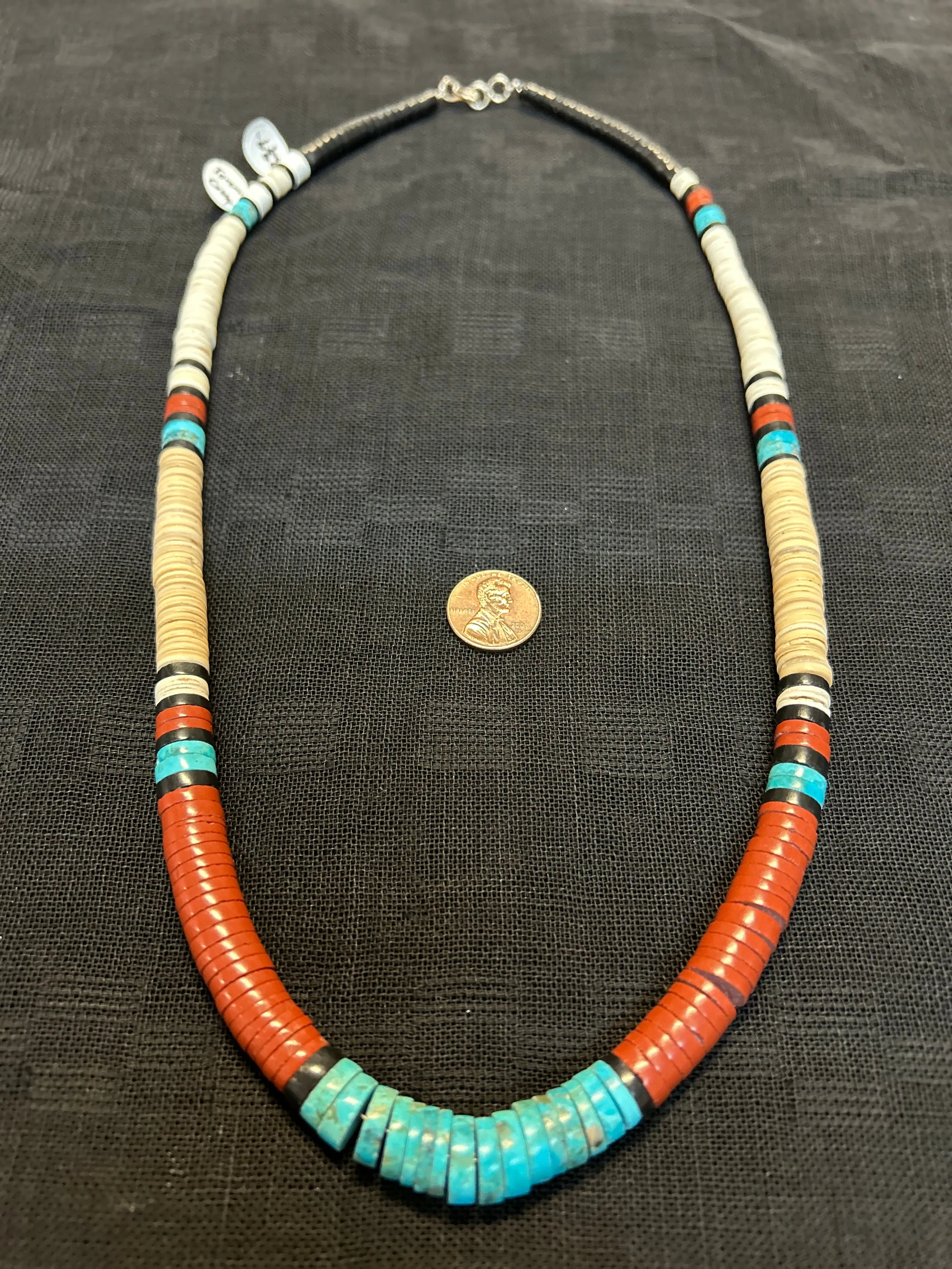 Kewa (Santo Domingo) handcrafted by Trevia Crespin.  Genuine Turquoise, pipestone, black onyx, and clamshell necklace.  LZ005